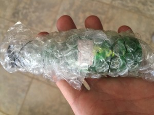 Bubble Wrapped Rum Bottle - Vokda Piñata DJ activity idea